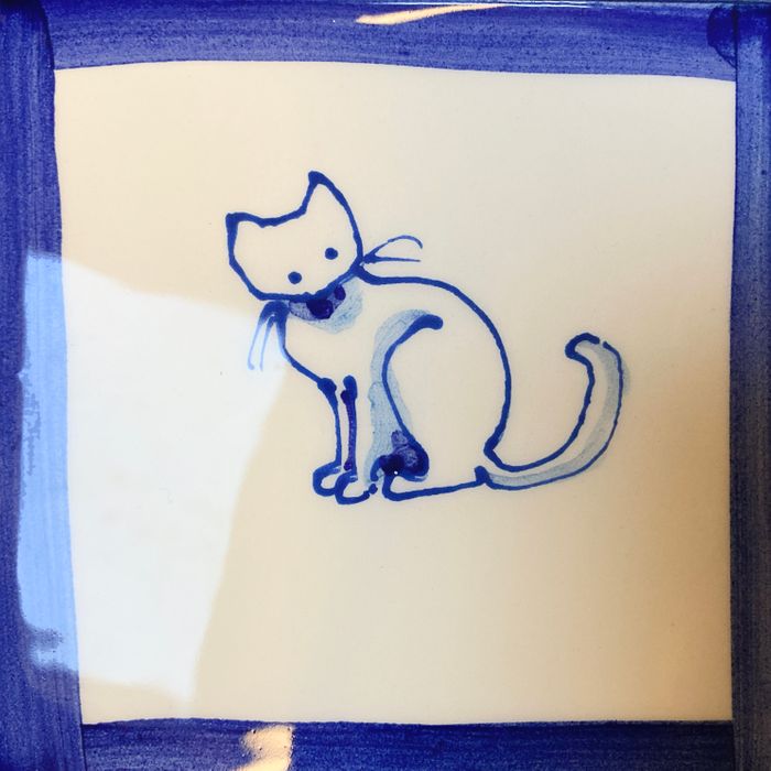 Hand painted delft style cats