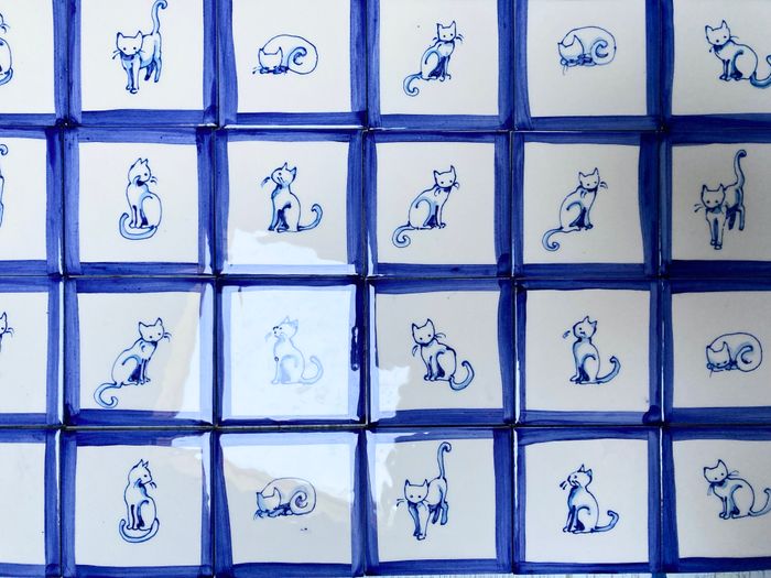 Hand painted delft style cats