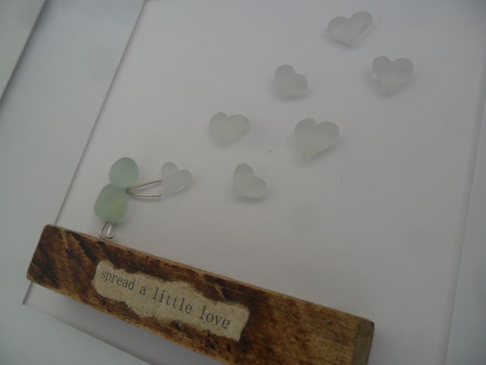 Uplifting hand crafted framed sea glass artwork