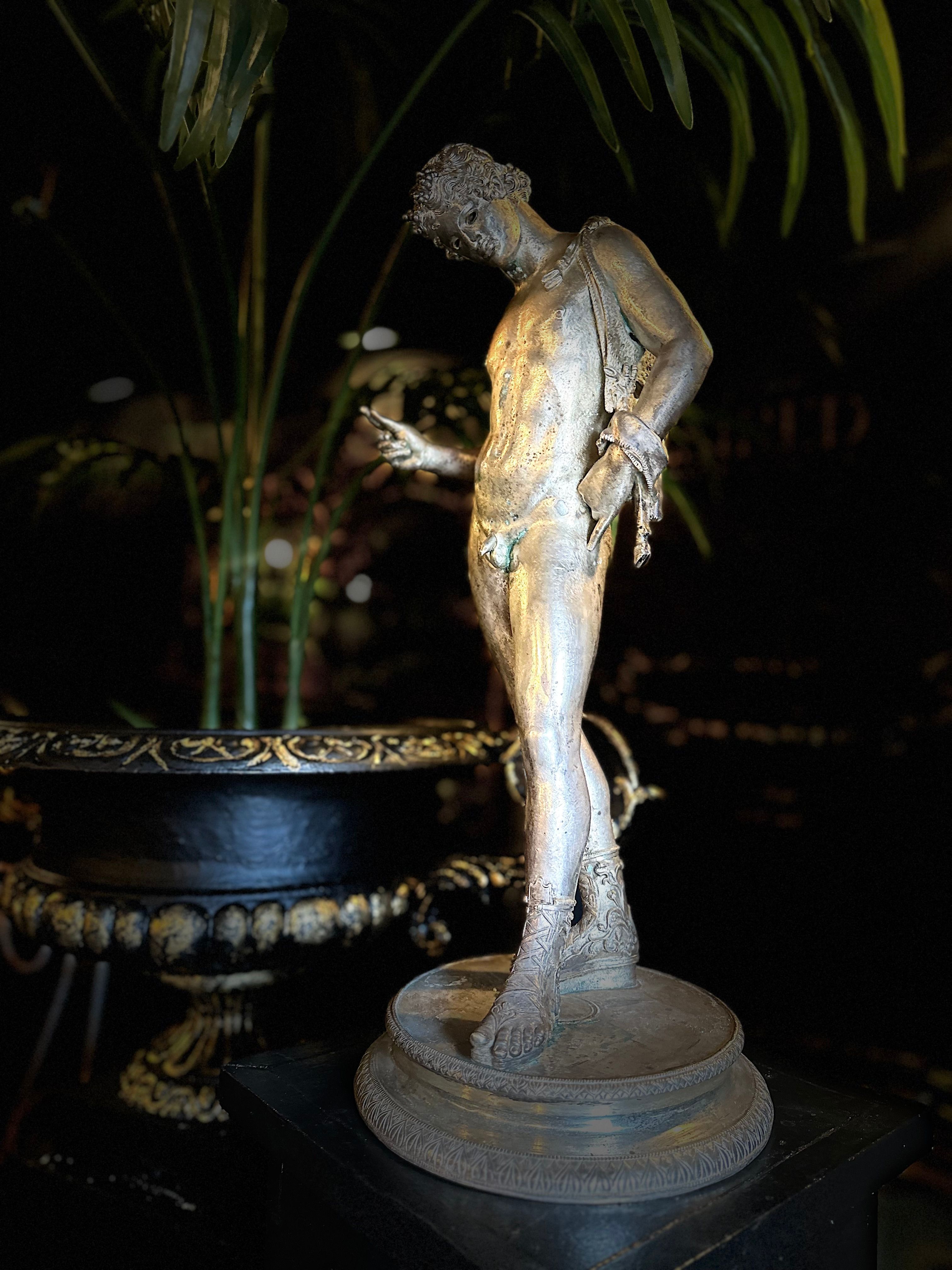 Large silver grand tour sculpture of a male nude, Narcissus.