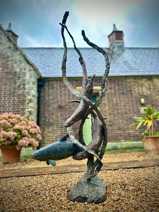 Playful Otters by David Cemmick