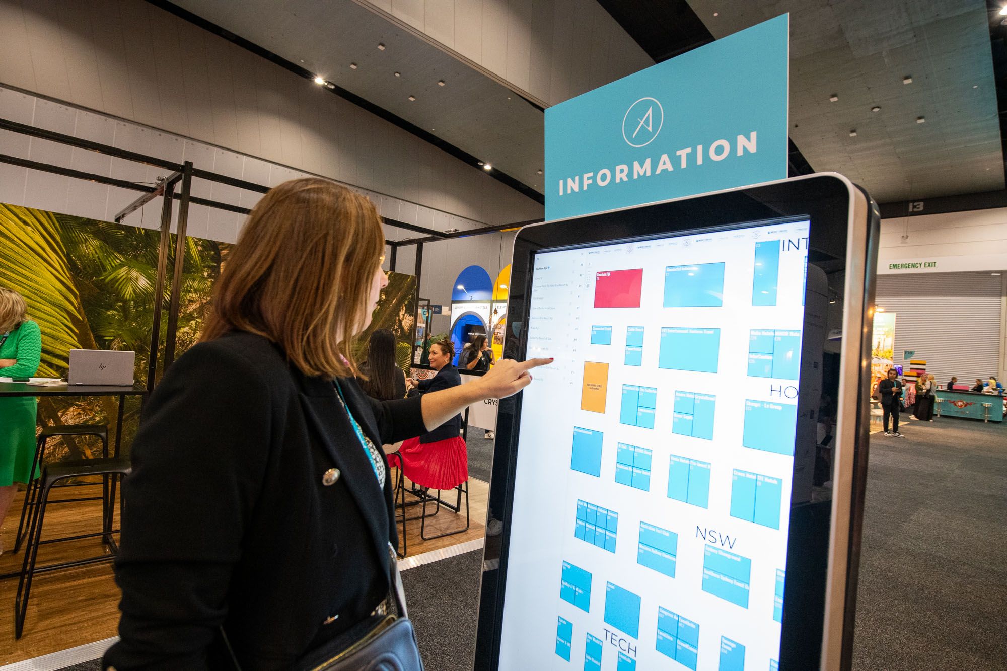 Person looking for a stand at AIME using a digital floorplan