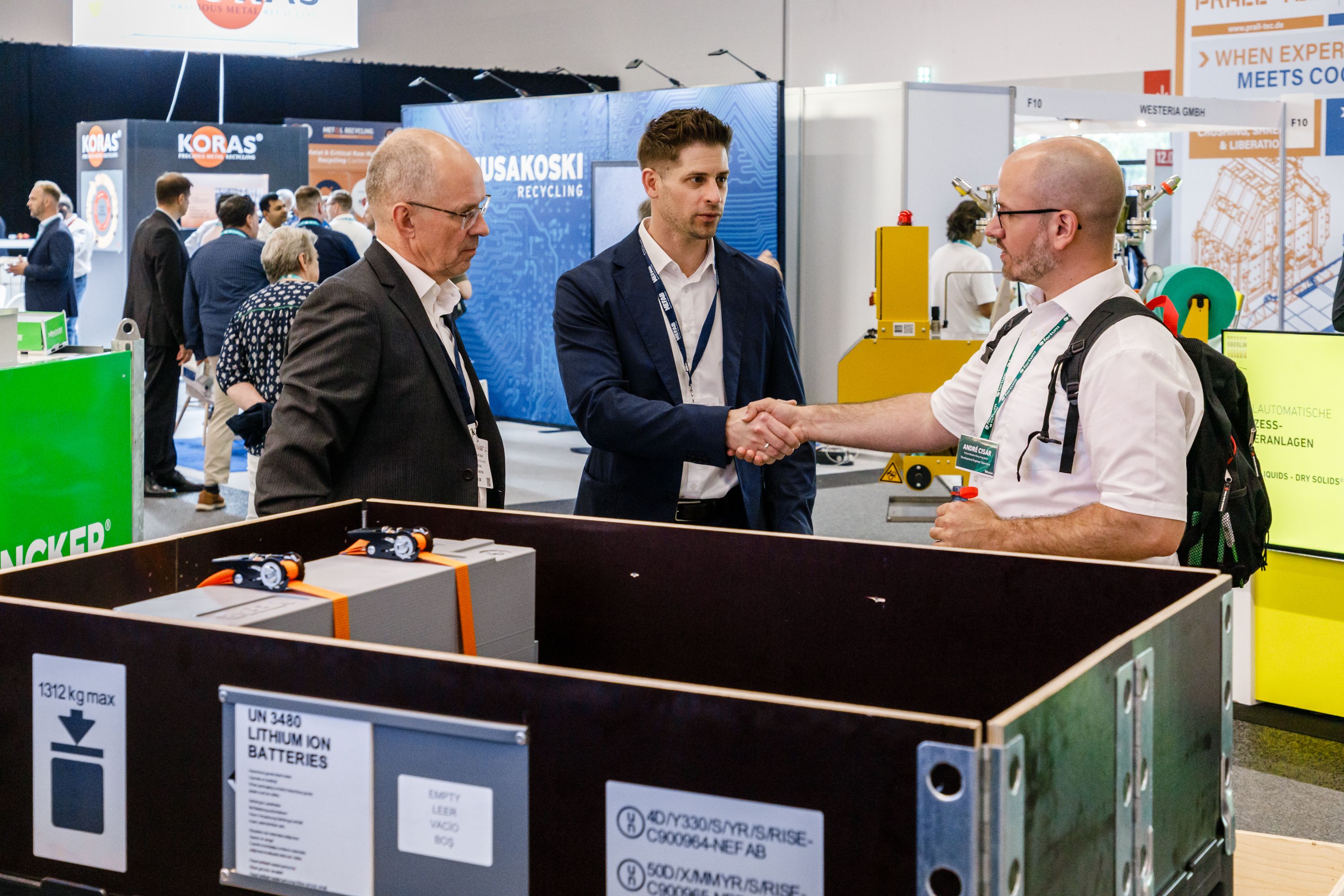 event attendees speaking at Battery Recycling Expo 2026