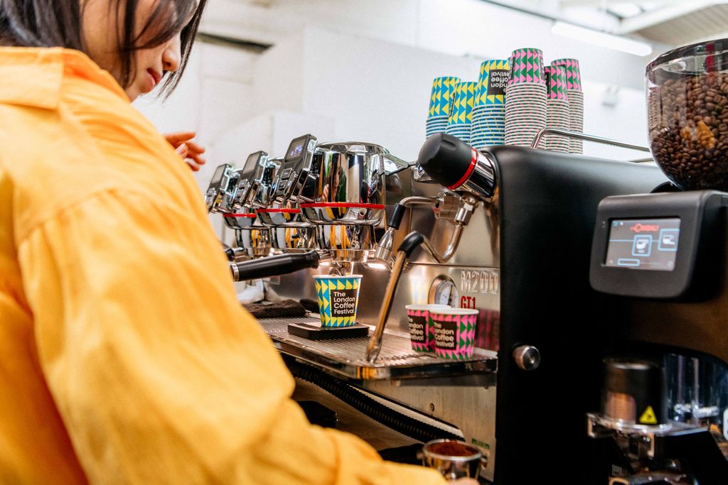 Coffee machine with coffee coming out