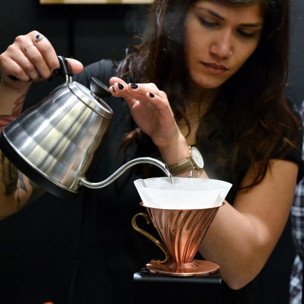 Woman pouring coffee