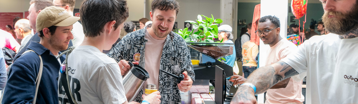 Men pouring coffee at LCF