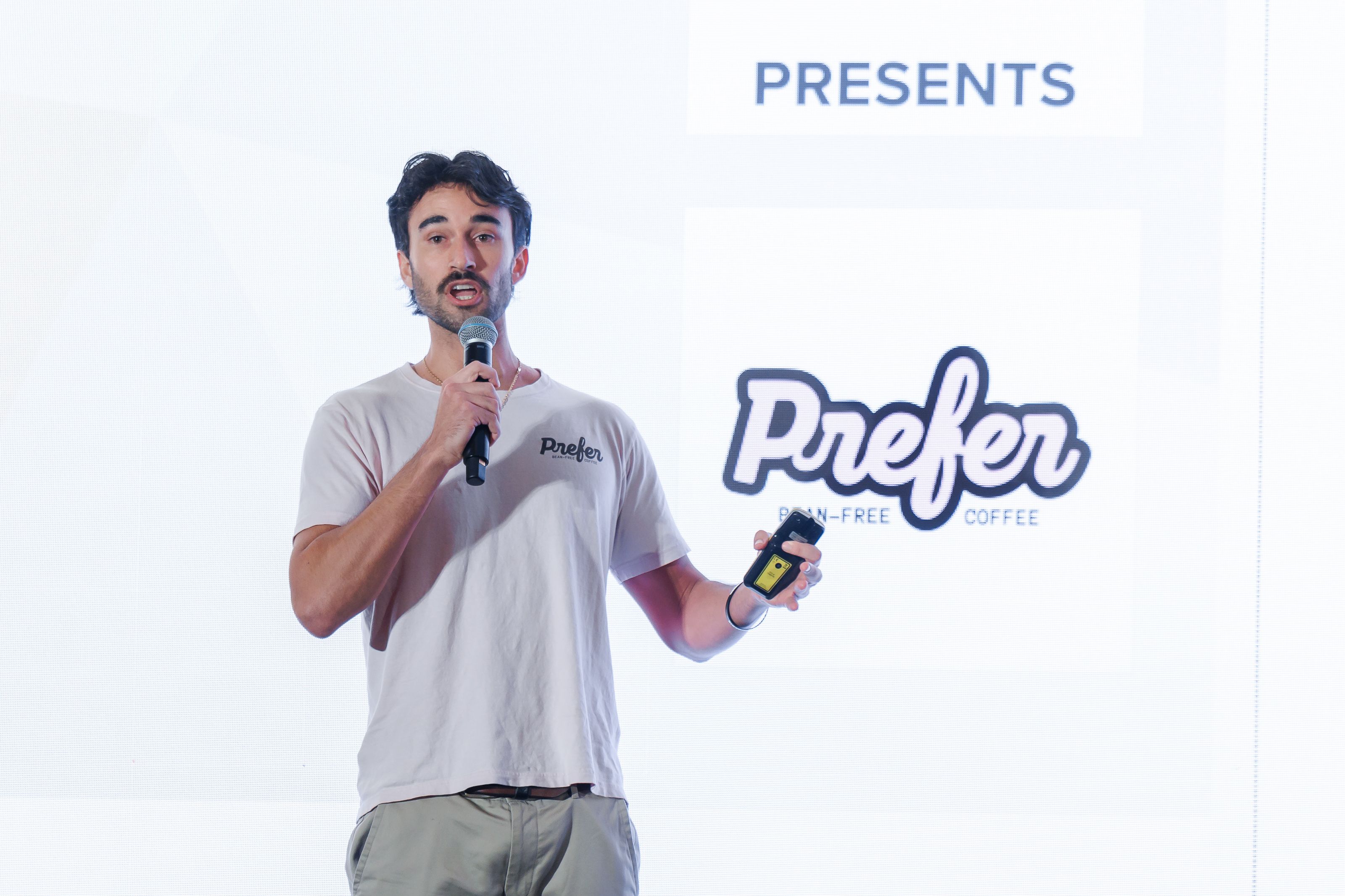 Prefer CEO Jake Berber pitching on stage at the Asia-Pacific Agri-Food Innovation Summit 2024